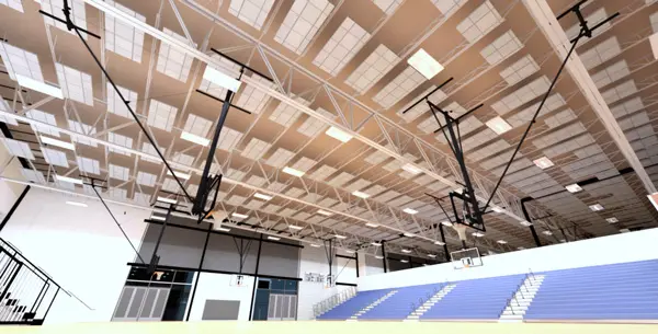 Gymnasium ceiling with basketball hoops visible.