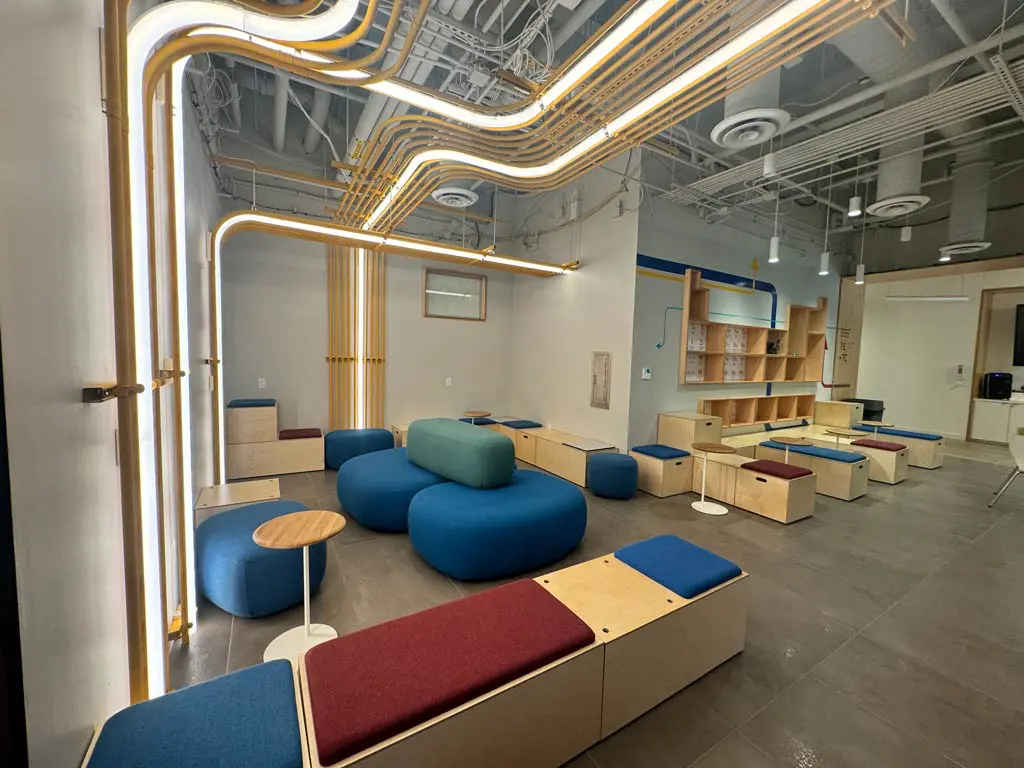 Modern lounge area with colorful seating.