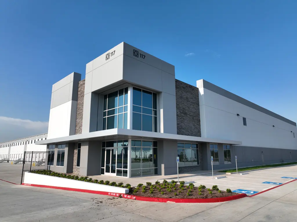 Modern commercial building with glass entrance.